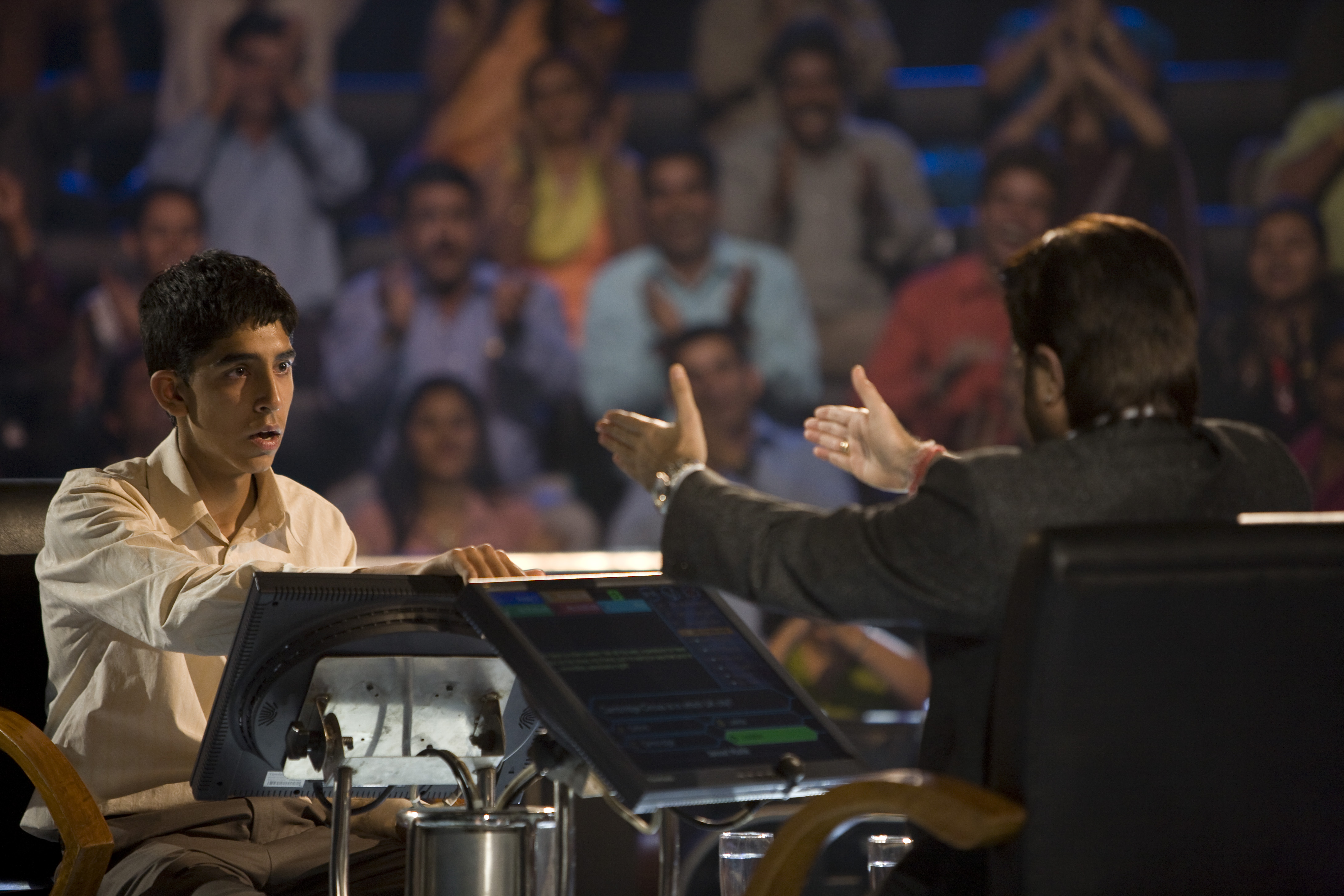 slumdog millionare Slumdog millionaire is the story of jamal malik (patel), an 18 year-old orphan from the slums of mumbai. slumdog millionare Slumdog millionaire is the story of jamal malik (patel), an 18 year-old orphan from the slums of mumbai.